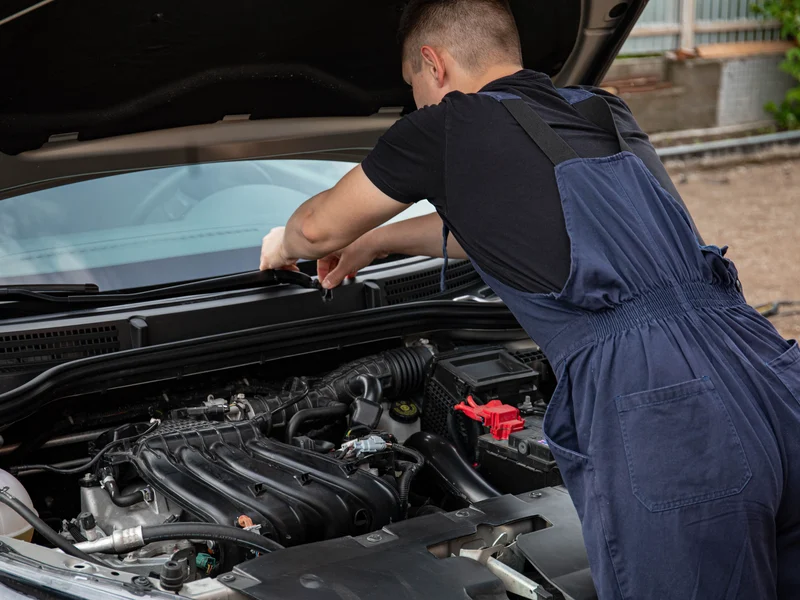 Technician diagnosing a vehicle in Chesapeake, VA